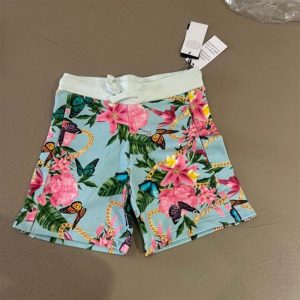 guess short celeste con fiori e farfalle
