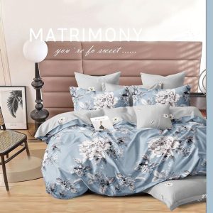 Copripiumino matrimoniale in stampa floreale in colore azzurro e federe coordinate