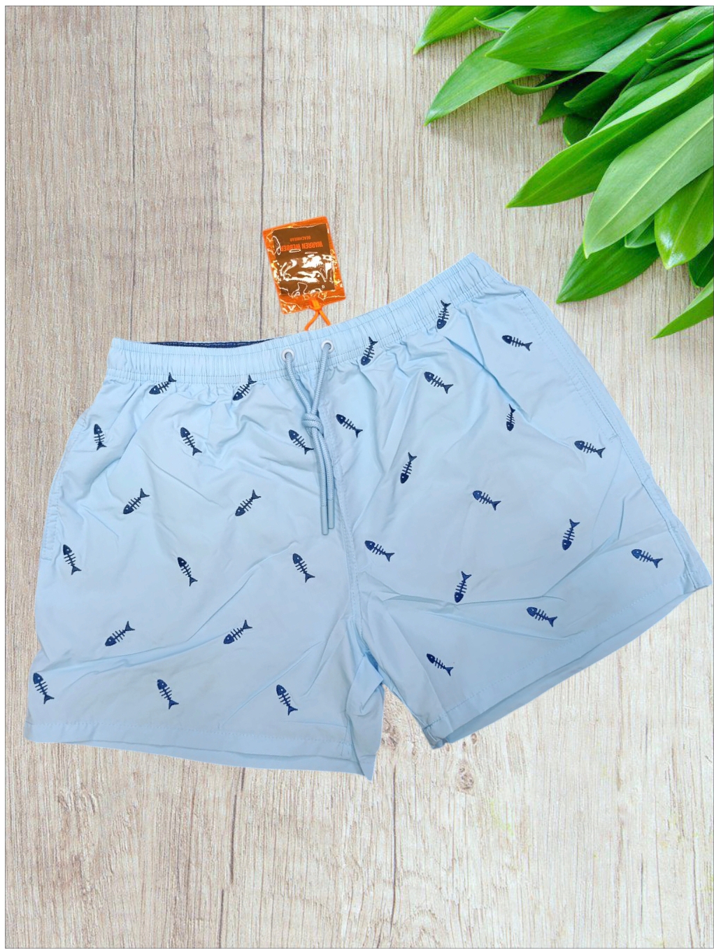 Costume uomo a pantaloncino modello “lisca di pesce” in colore celeste