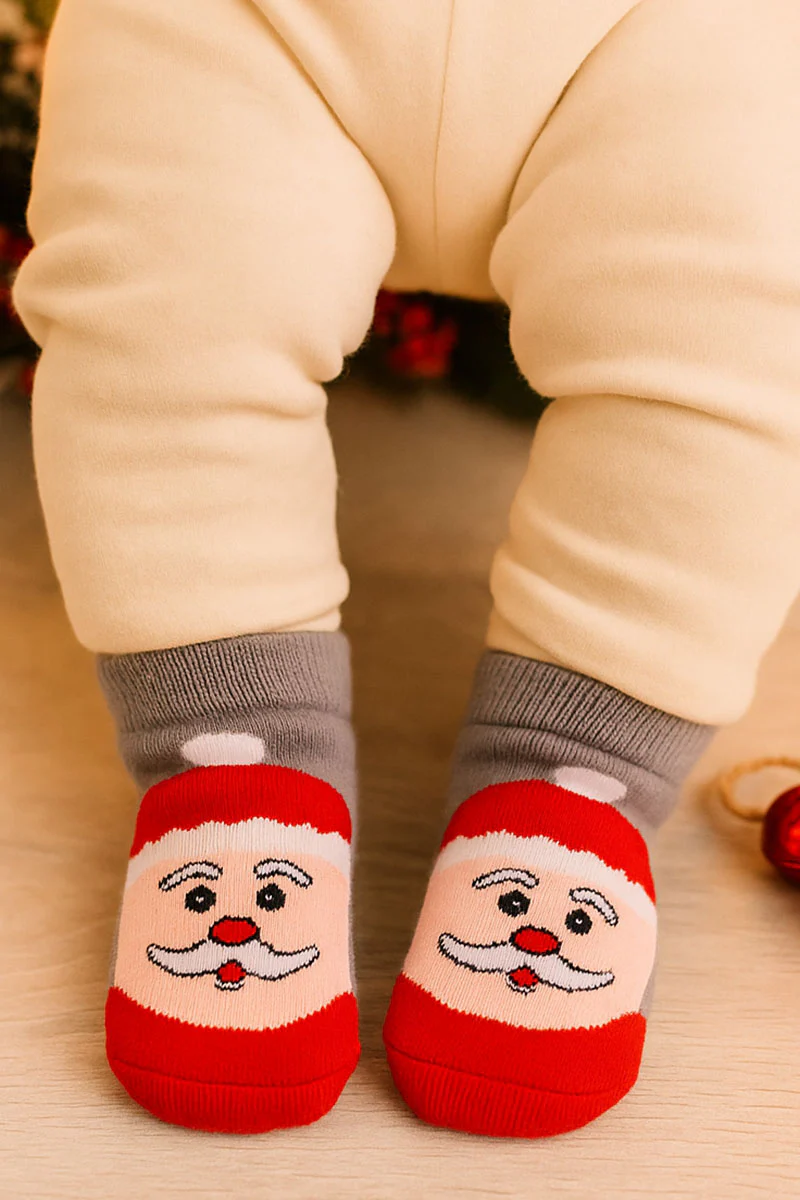 Calzino in spugna con applicazione antiscivolo fantasia natale - immagine 2